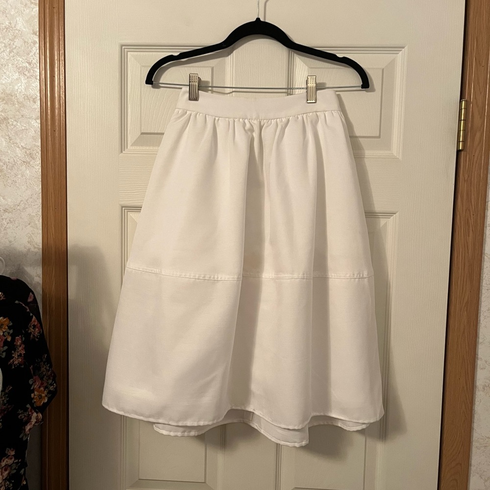 High waisted white knee length skirt